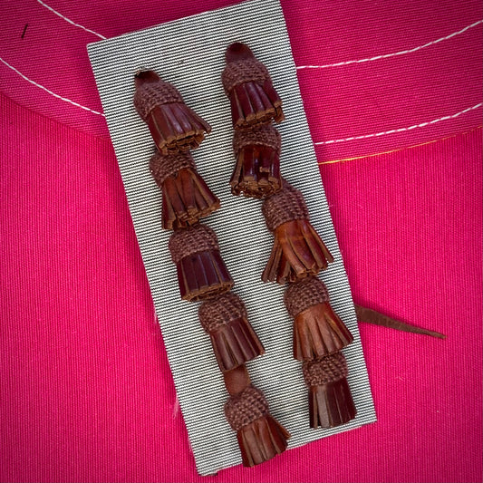 JUEGO DE CAIRELES DE CUERO