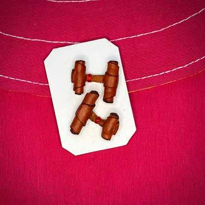 JUEGO DE GEMELOS DE CUERO